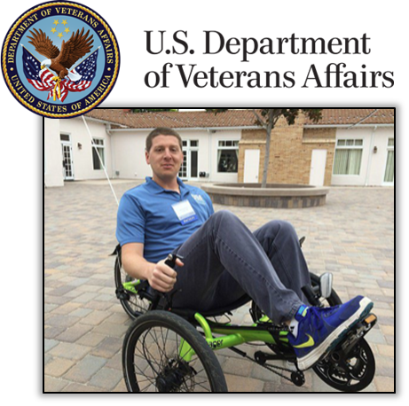 U.S. Department of Veterans Affairs Logo over a man operating a low-riding wheelchair that has been modified for recreation.